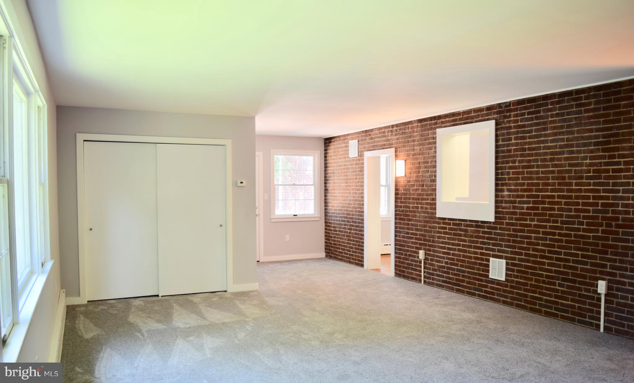 22 Rolling Road Claymont, DE 19703 - Photo 21 of 41 Gorgeous Brick wall in Family room