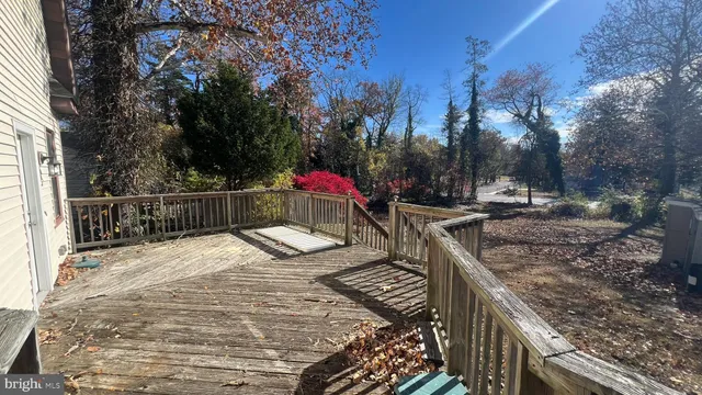 a view of a backyard and a fire pit