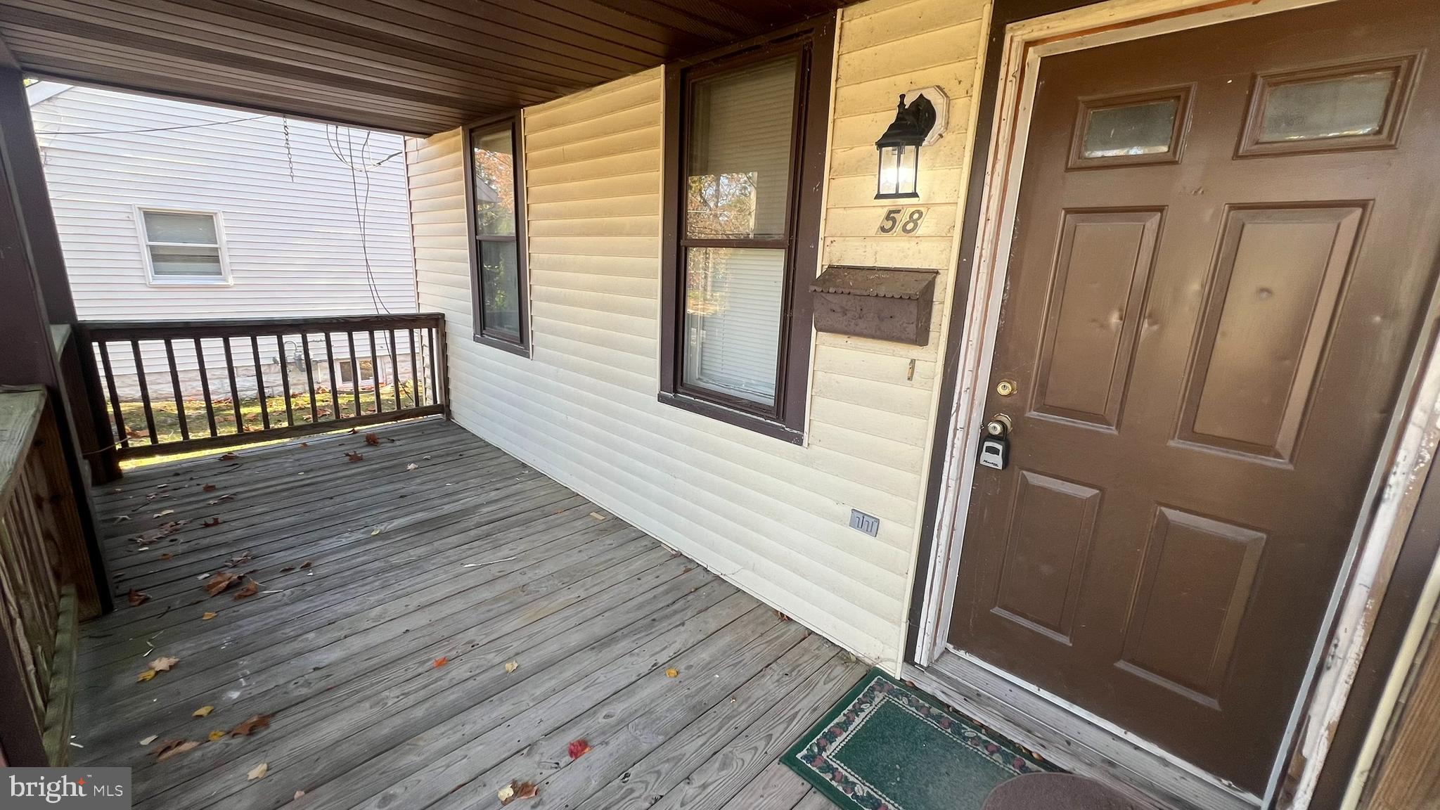 58 Chews Landing Road Clementon, NJ 08021 - Photo 4 of 21 a view of a balcony with wooden floor