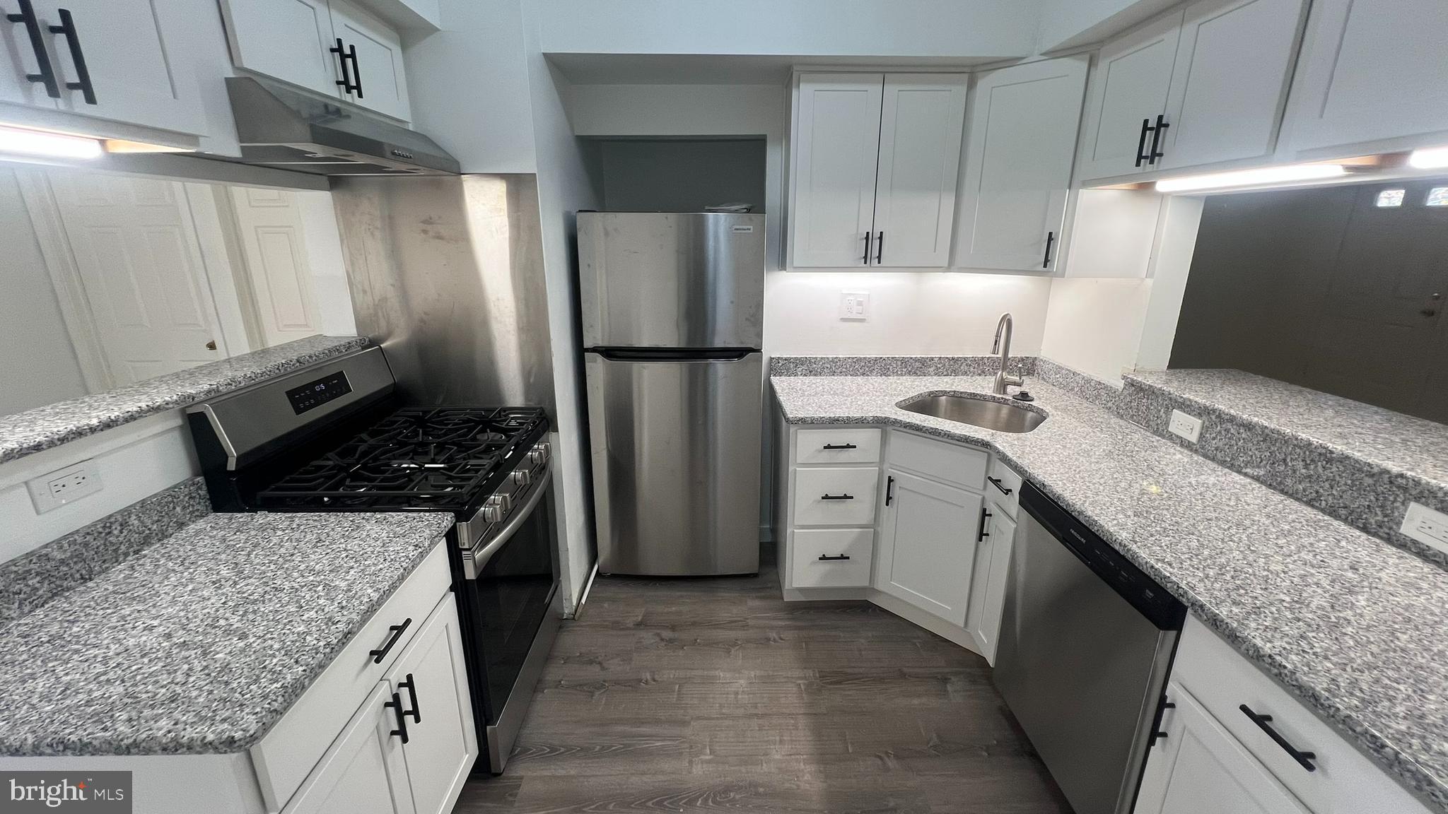 58 Chews Landing Road Clementon, NJ 08021 - Photo 9 of 21 a kitchen with a stove refrigerator and microwave