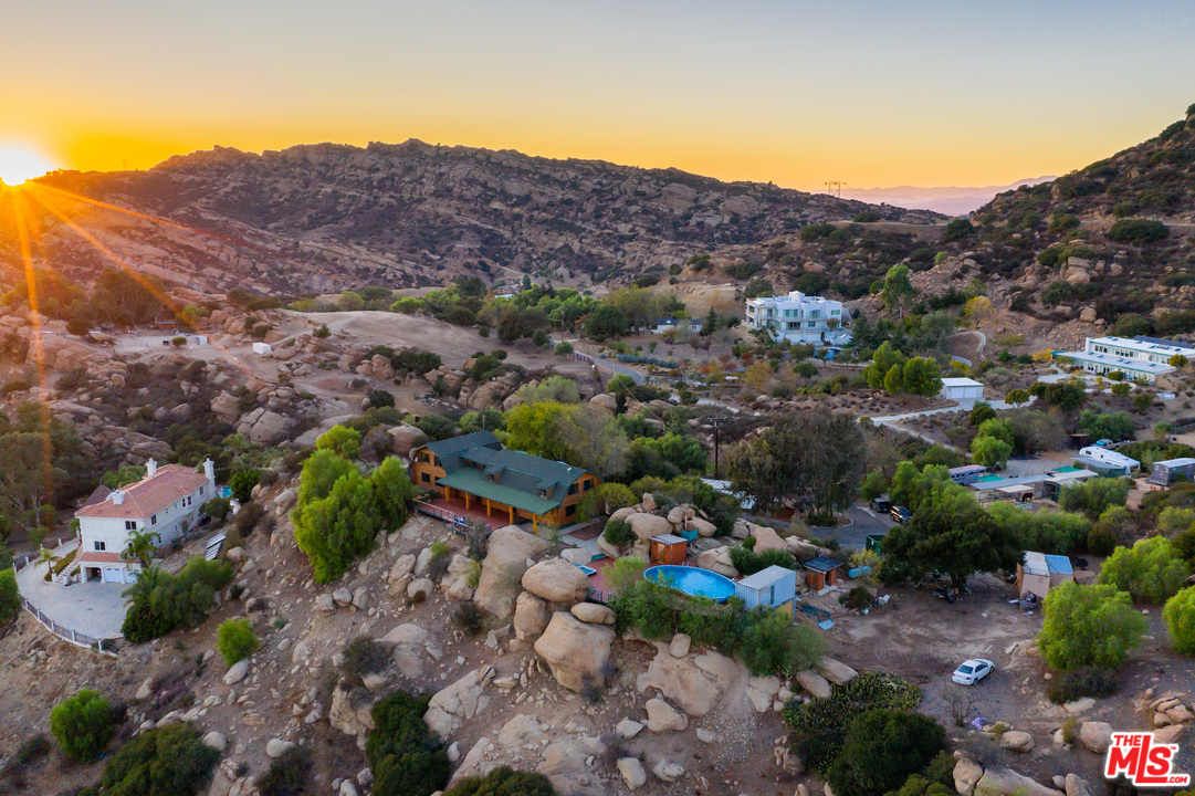 7429 Studio Road West Hills, CA 91304 - Photo 44 of 44 a view of a city with mountains in the background