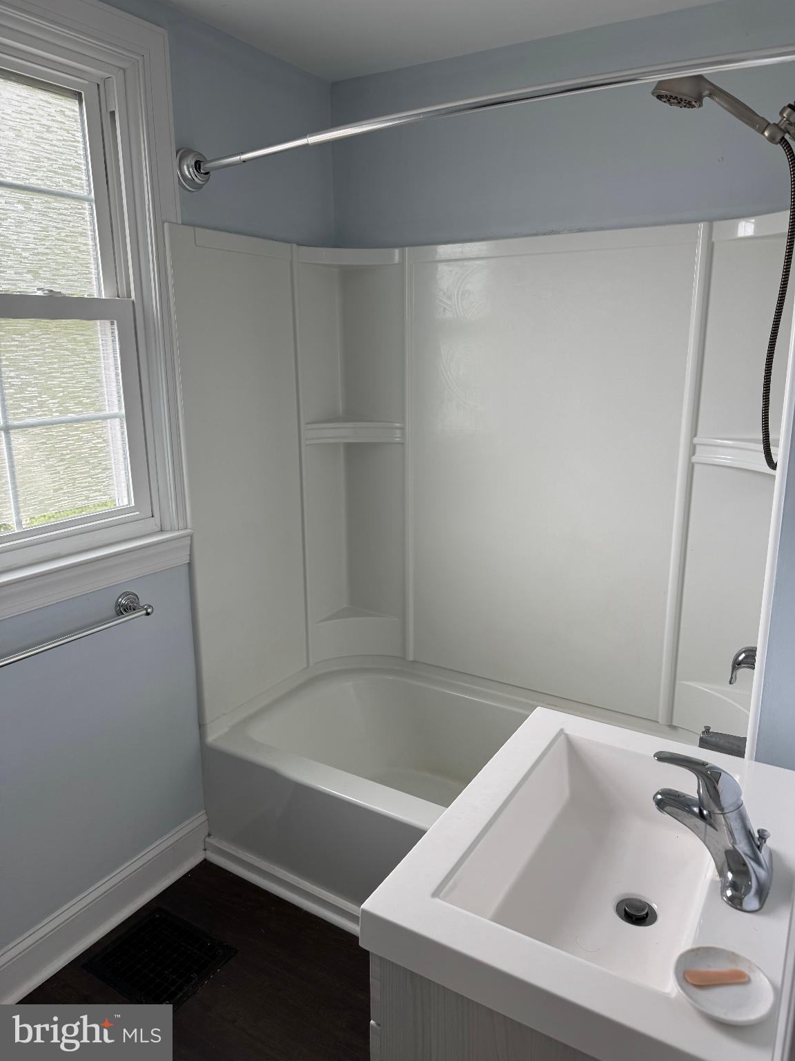 237 South Atlantic Avenue, Unit B Haddonfield, NJ 08033 - Photo 6 of 10 a bathroom with a tub and a sink