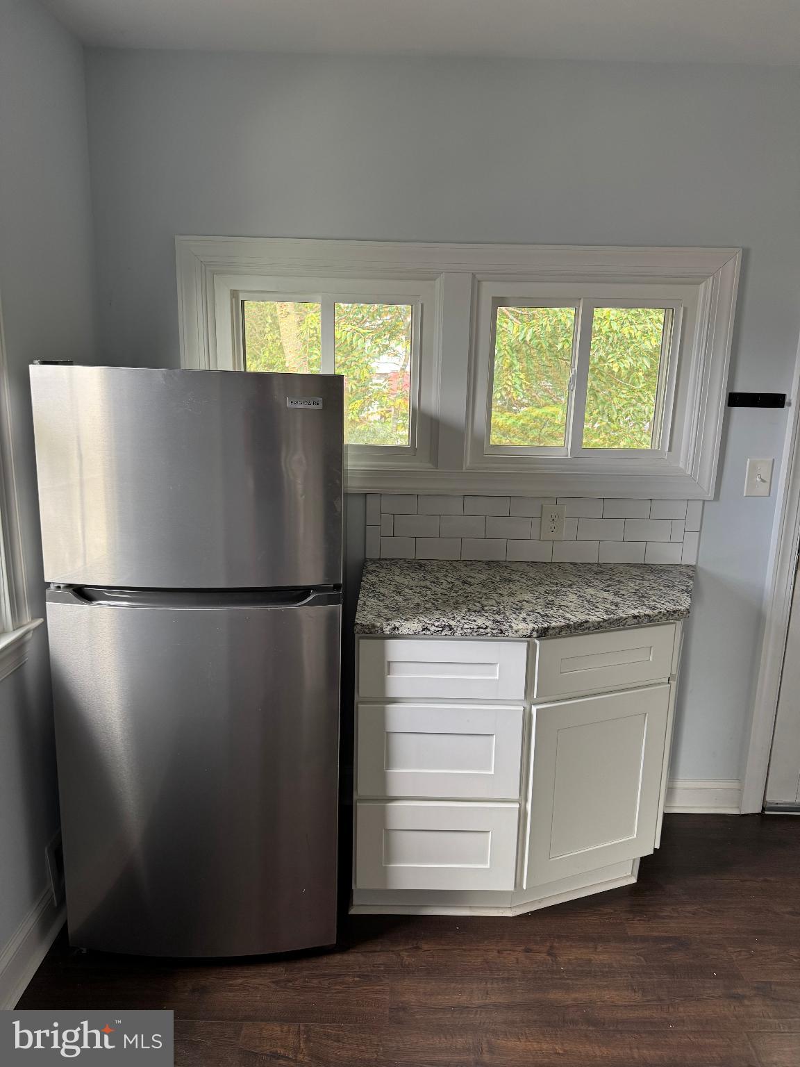 237 South Atlantic Avenue, Unit B Haddonfield, NJ 08033 - Photo 8 of 10 a kitchen with a refrigerator and window