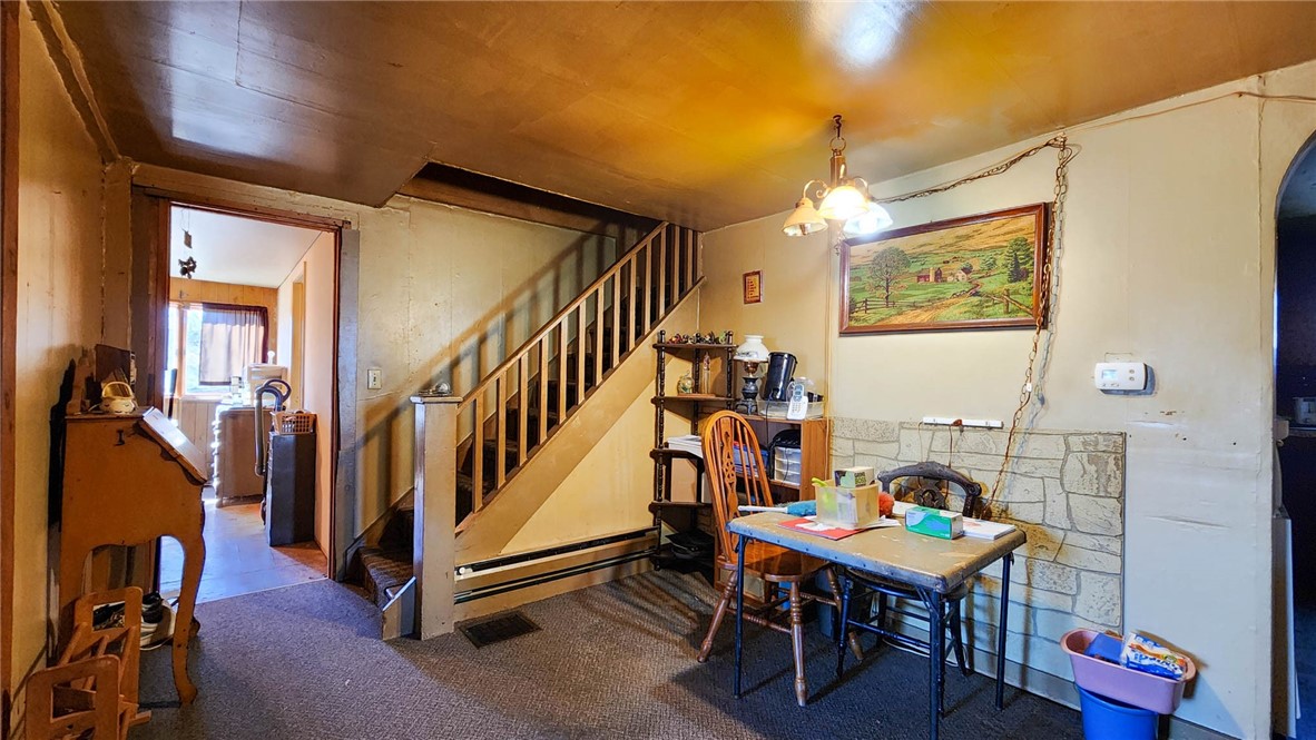2572 Cowan Road York, NY 14533 - Photo 7 of 13 dining room/stairwell