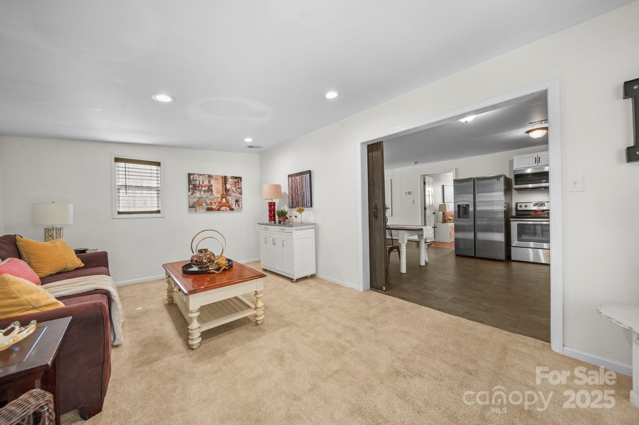 452 18th Street Cramerton, NC 28032 - Photo 17 of 35 a living room with furniture and a wooden floor