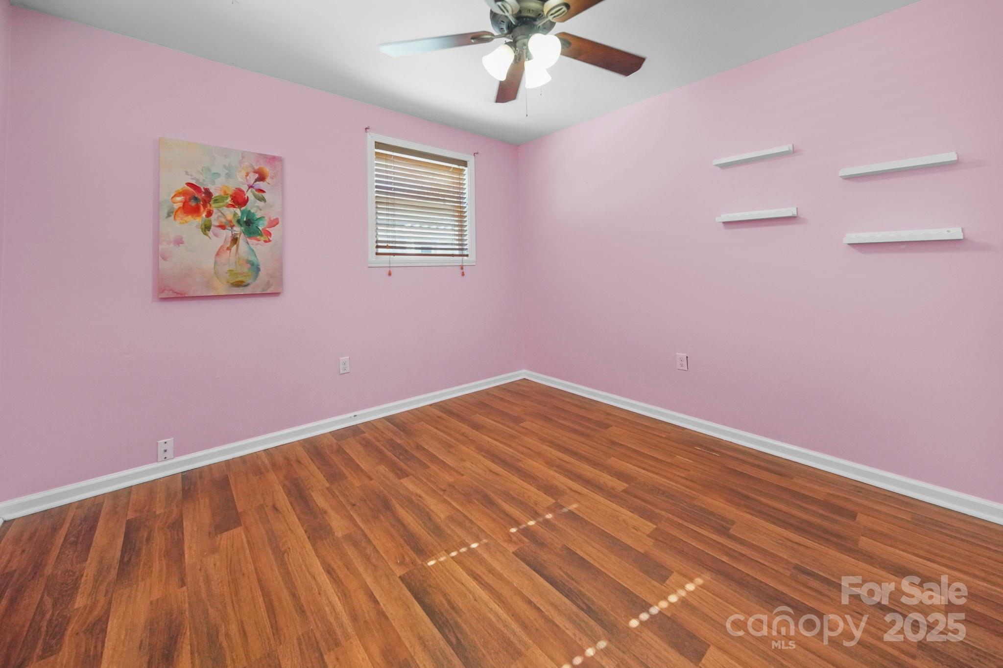 452 18th Street Cramerton, NC 28032 - Photo 26 of 35 a view of empty room with wooden floor