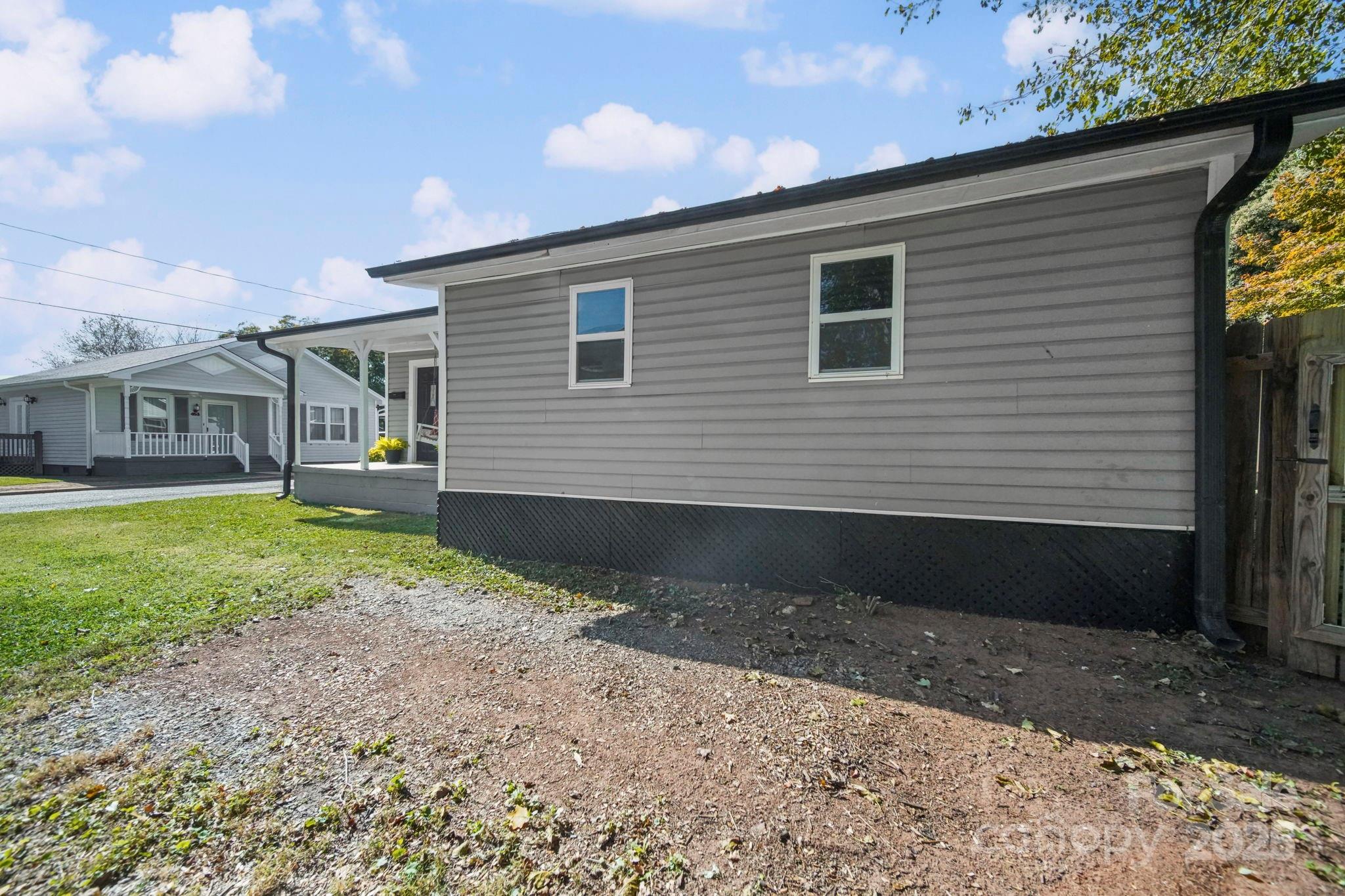 452 18th Street Cramerton, NC 28032 - Photo 3 of 35 a view of a house with a yard