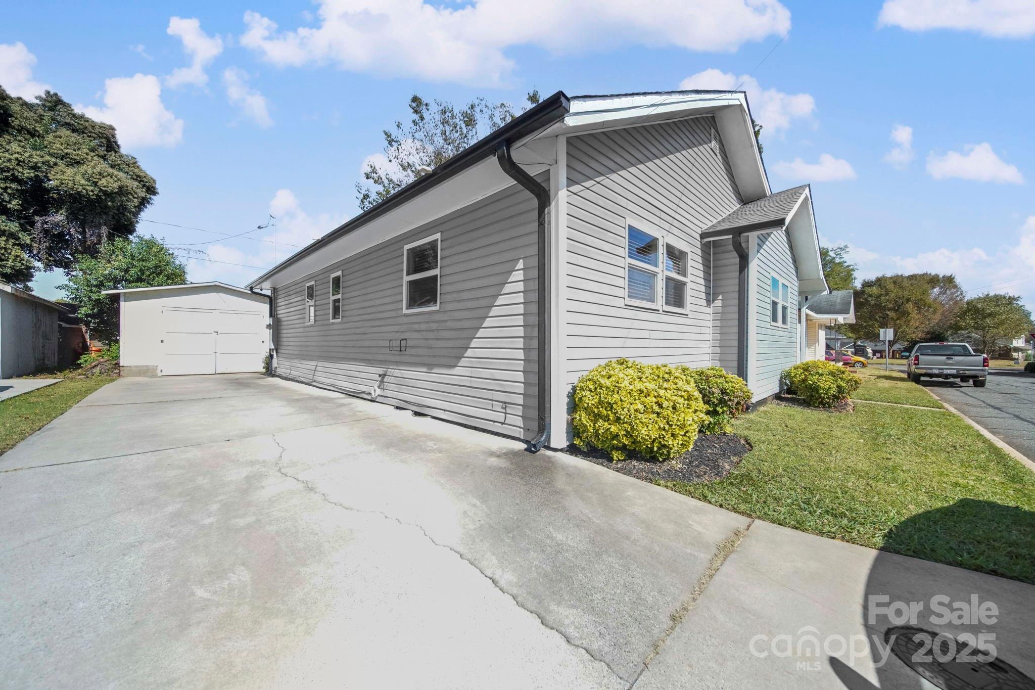 452 18th Street Cramerton, NC 28032 - Photo 33 of 35 a front view of a house with garden