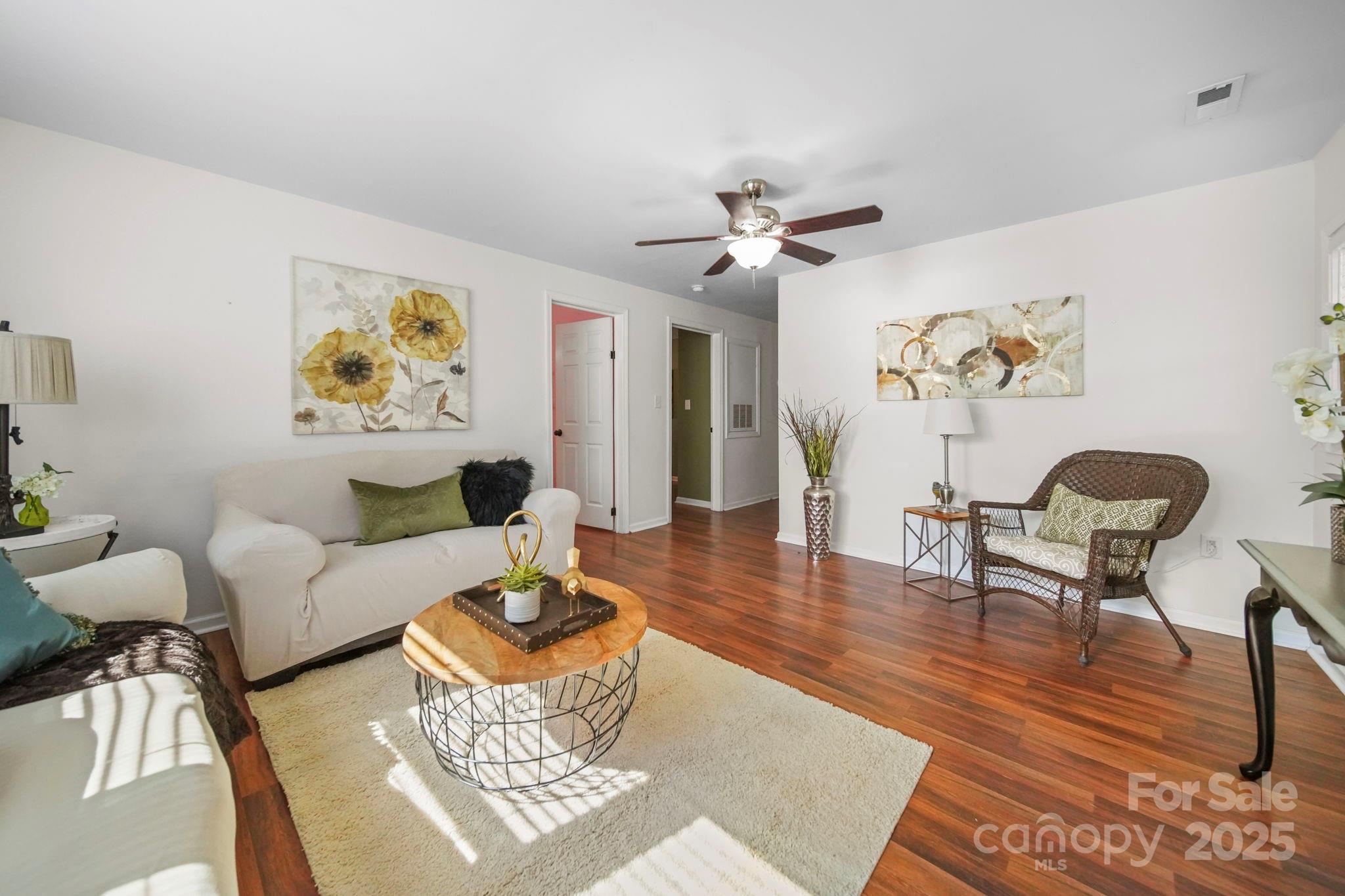 452 18th Street Cramerton, NC 28032 - Photo 5 of 35 a living room with furniture and wooden floor