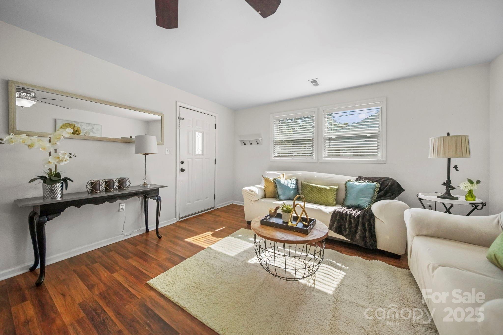 452 18th Street Cramerton, NC 28032 - Photo 7 of 35 a living room with furniture and wooden floor
