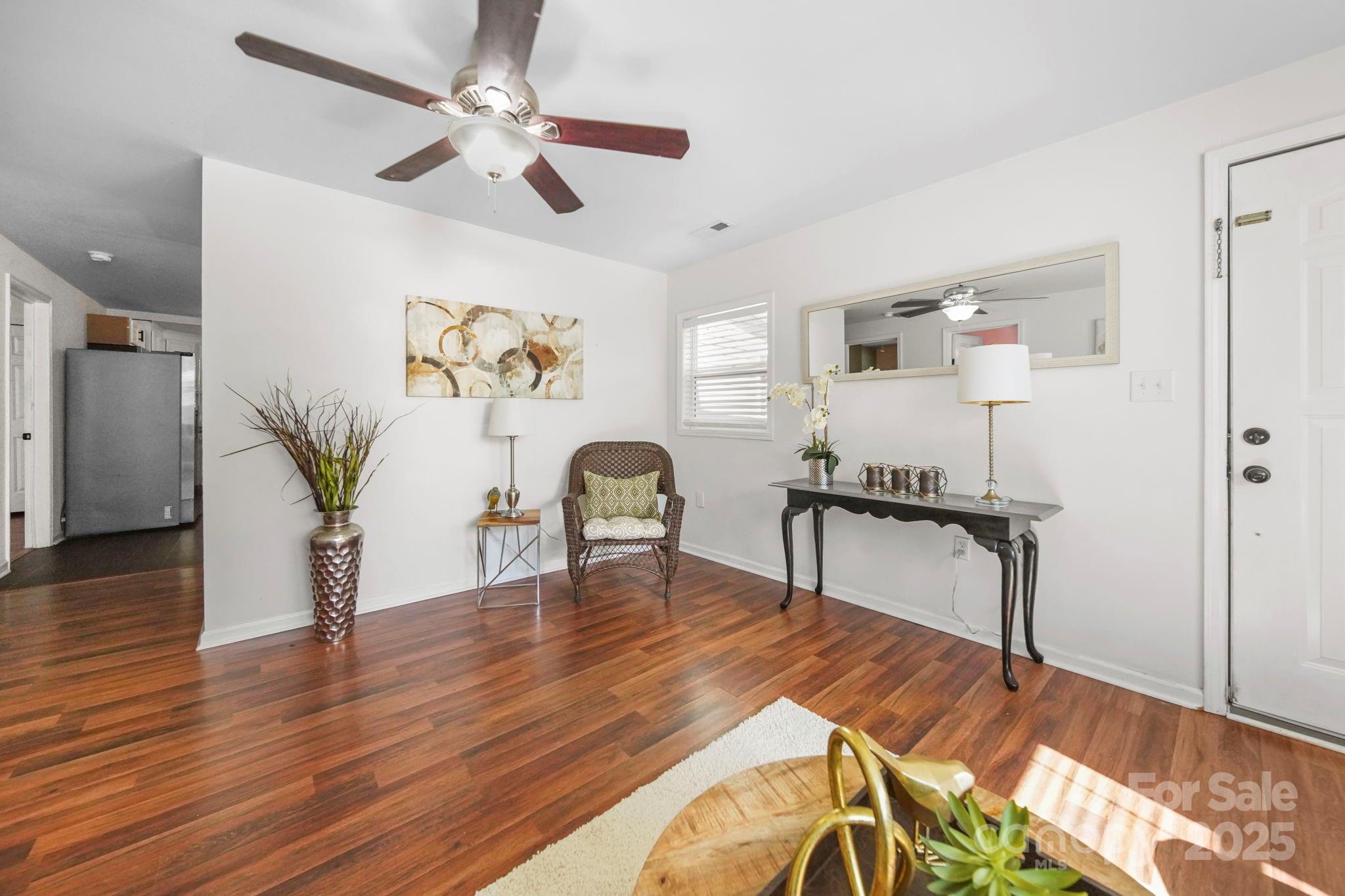 452 18th Street Cramerton, NC 28032 - Photo 8 of 35 a living room with furniture and a wooden floor