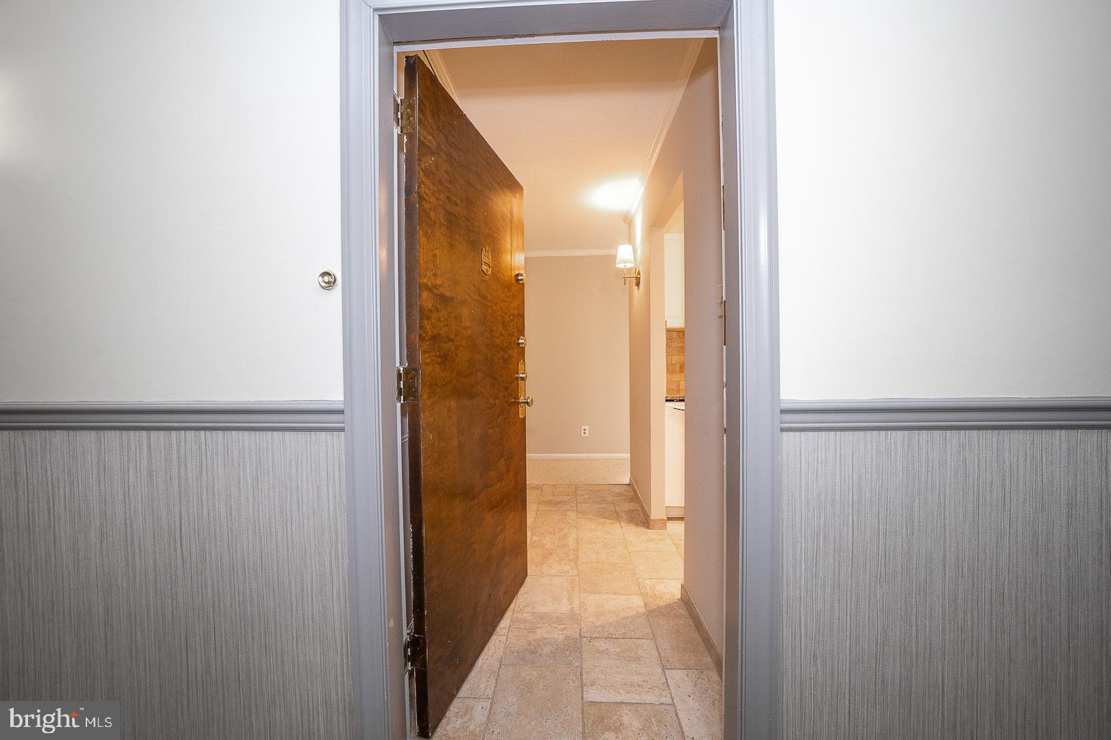 446 Drummers Lane Wayne, PA 19087 - Photo 3 of 27 a view of a bathroom from a hallway