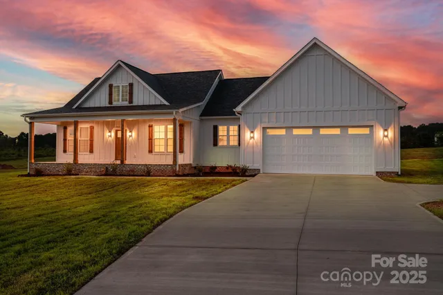 a front view of a house with yard