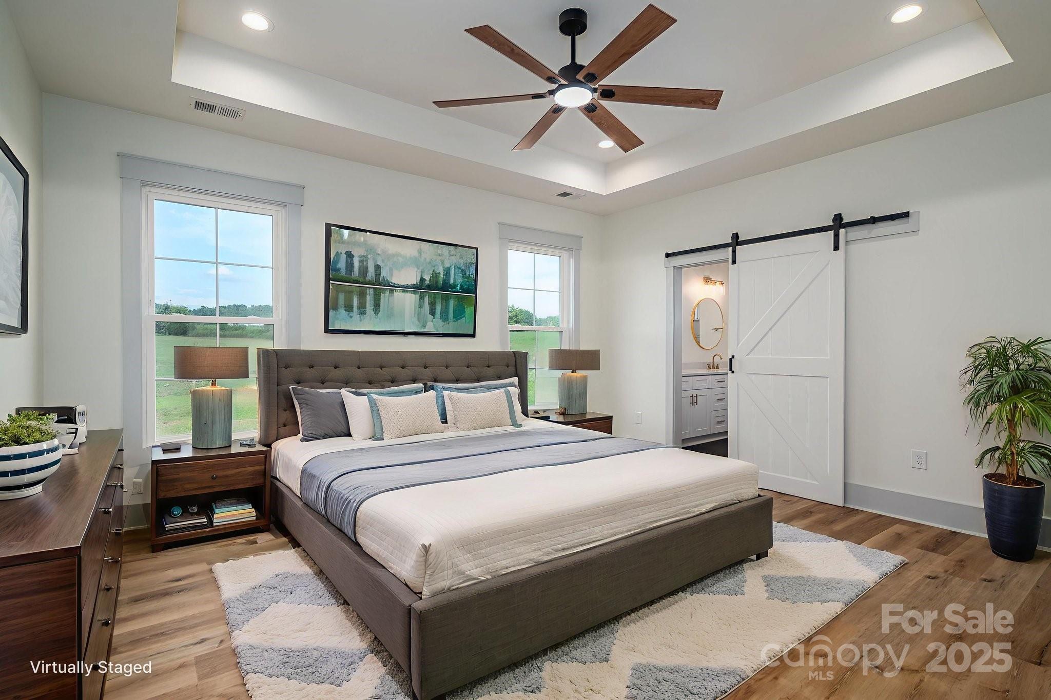 5384 Reepsville Road Vale, NC 28168 - Photo 16 of 44 a bedroom with a large bed couch and a window