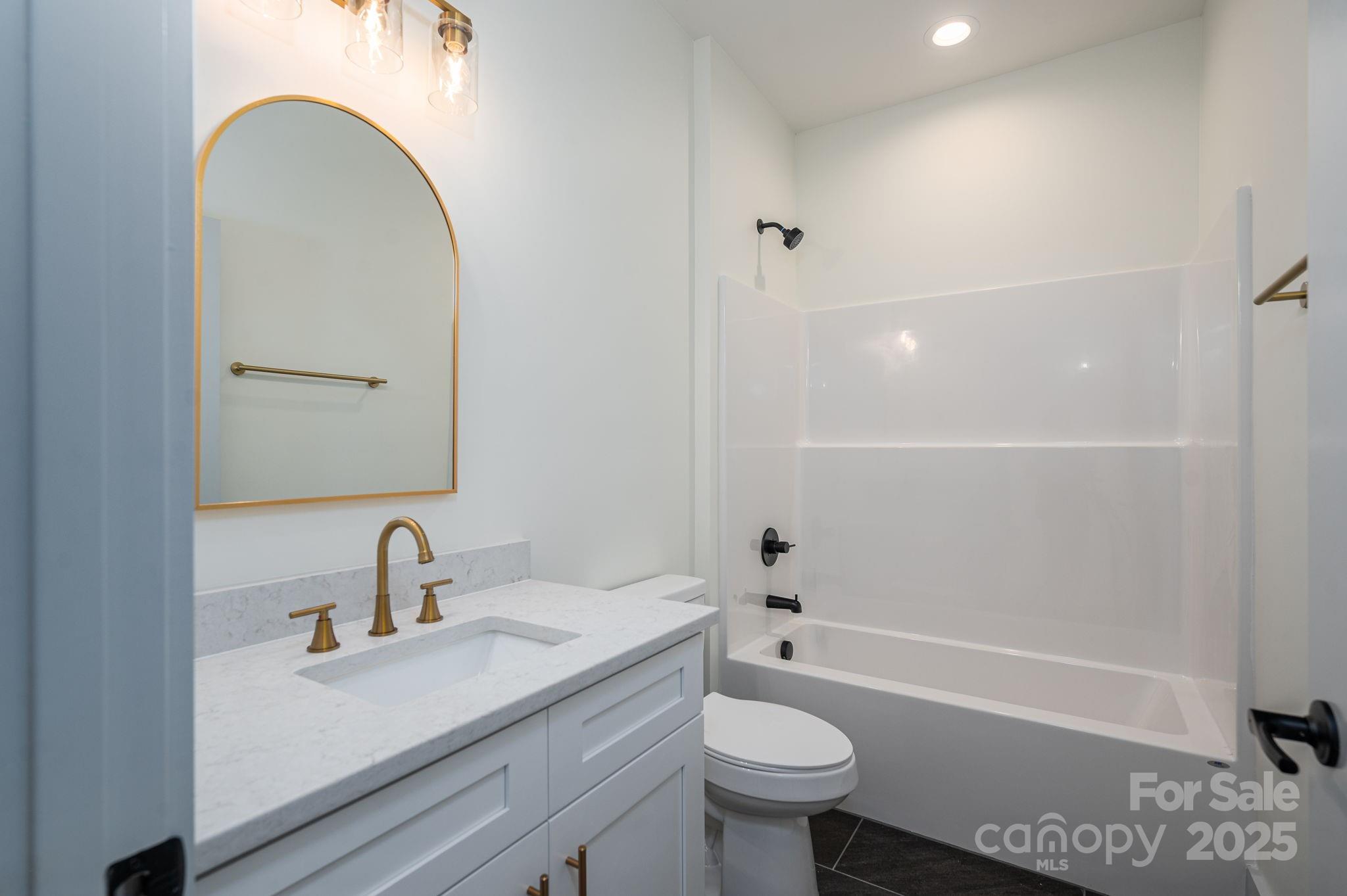 5384 Reepsville Road Vale, NC 28168 - Photo 27 of 44 a bathroom with a sink a toilet and shower