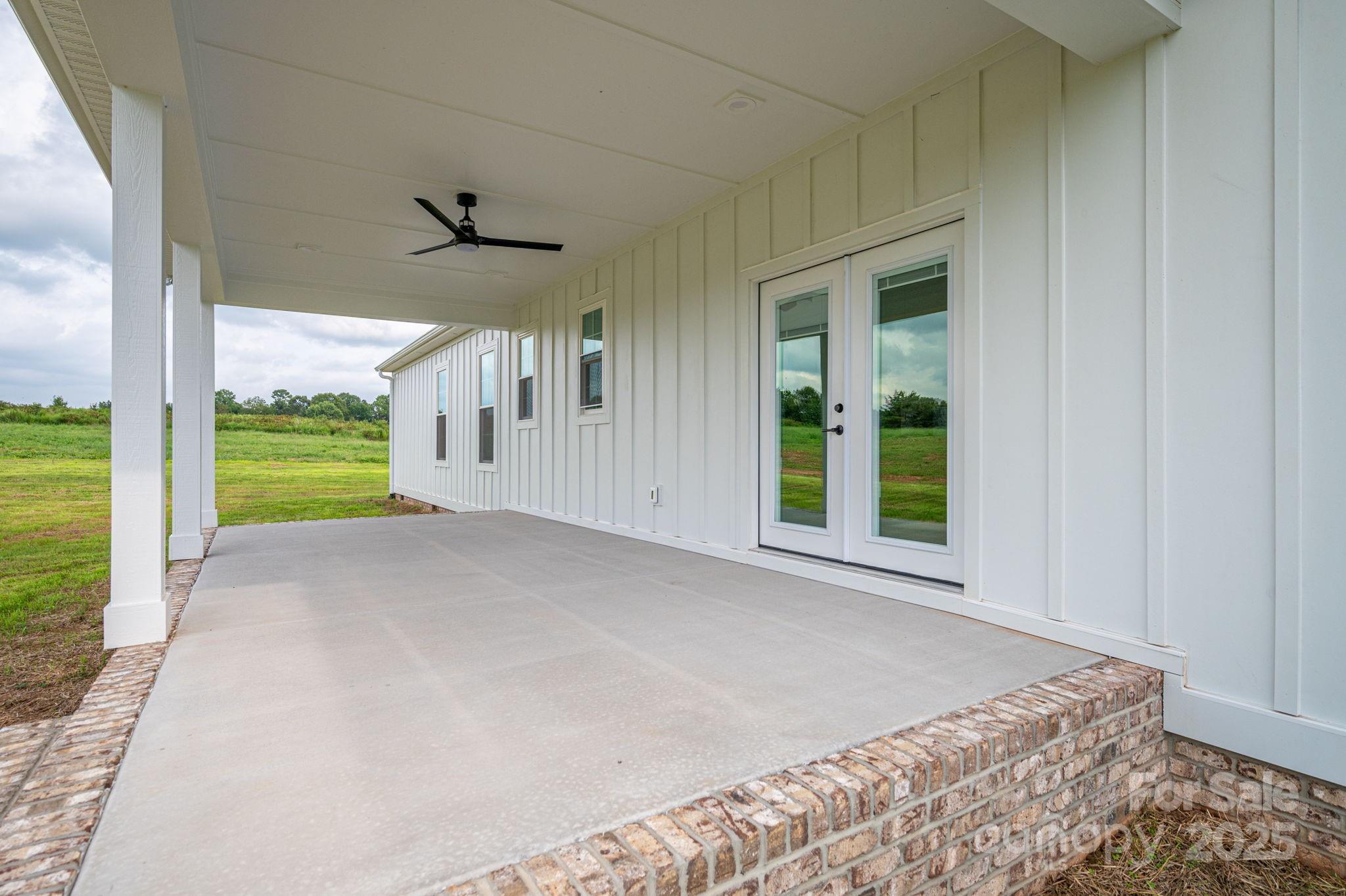 5384 Reepsville Road Vale, NC 28168 - Photo 39 of 44 a view of a room with a large window and hardwood
