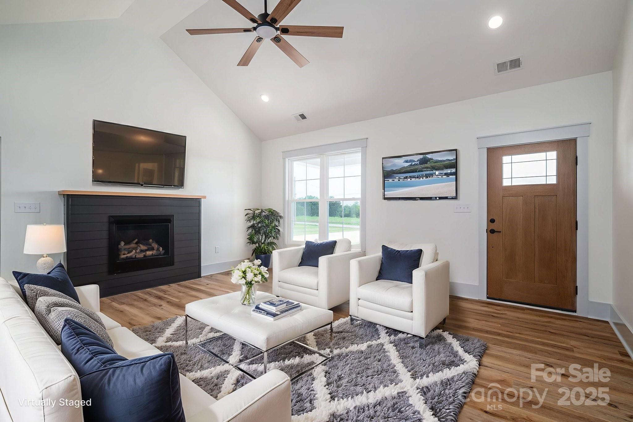 5384 Reepsville Road Vale, NC 28168 - Photo 4 of 44 a living room with furniture and a fireplace