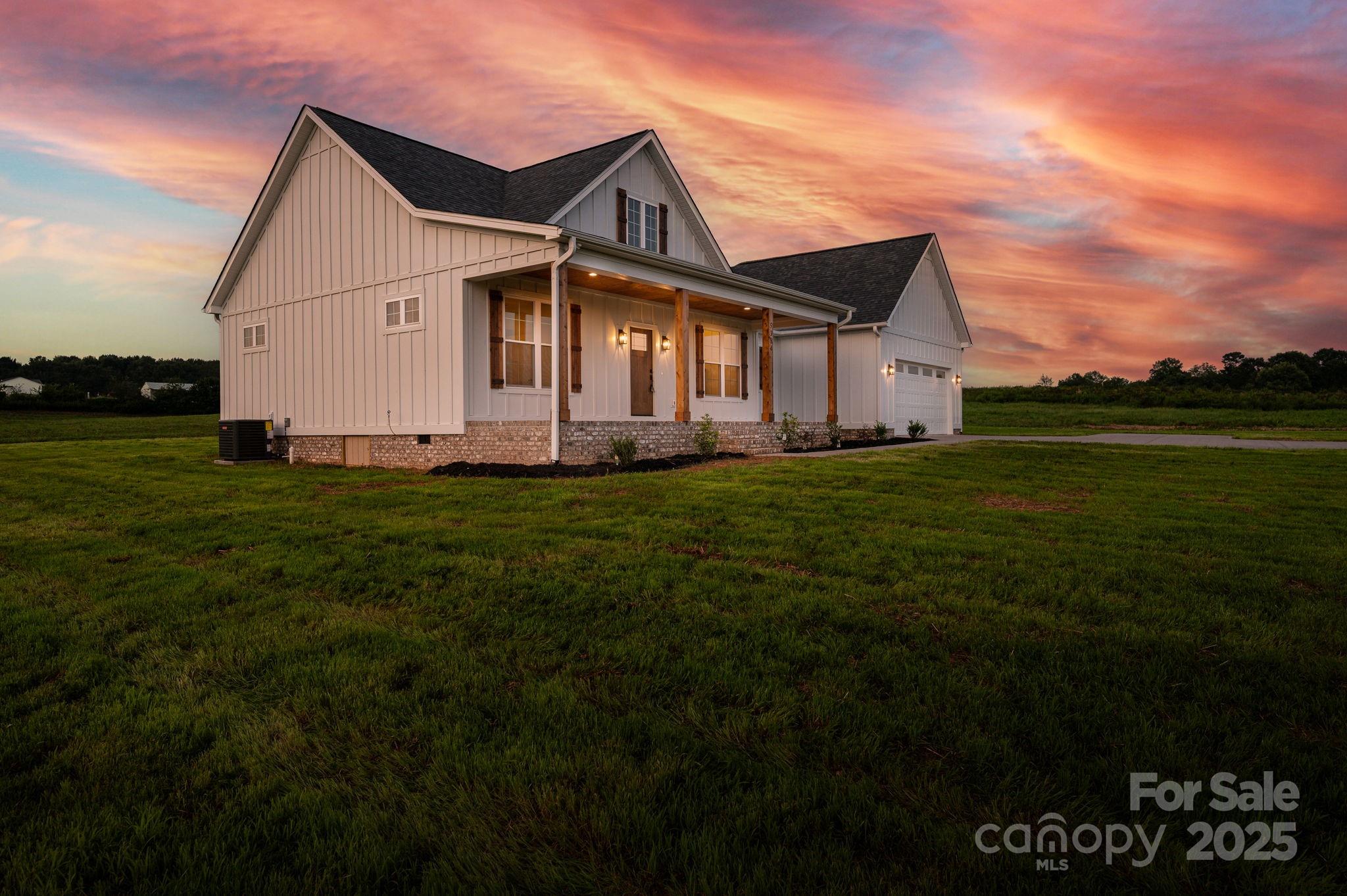 5384 Reepsville Road Vale, NC 28168 - Photo 43 of 44 a front view of a house with a garden