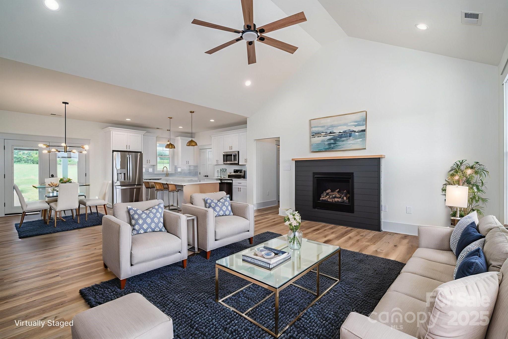 5384 Reepsville Road Vale, NC 28168 - Photo 6 of 44 a living room with furniture and a fireplace