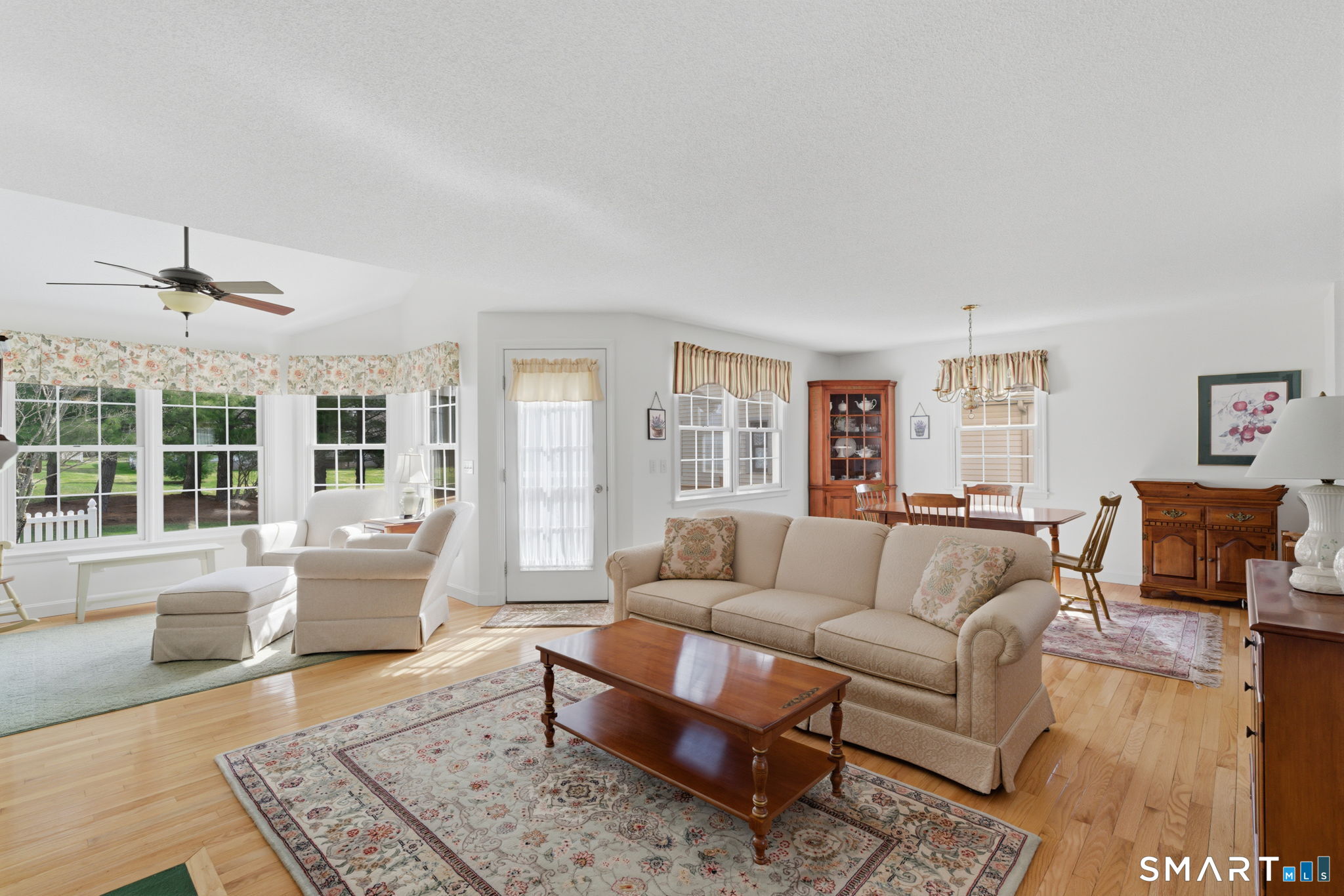 42 Dunham Street, Unit 42 Wethersfield, CT 06109 - Photo 12 of 40 a living room with furniture and a large window