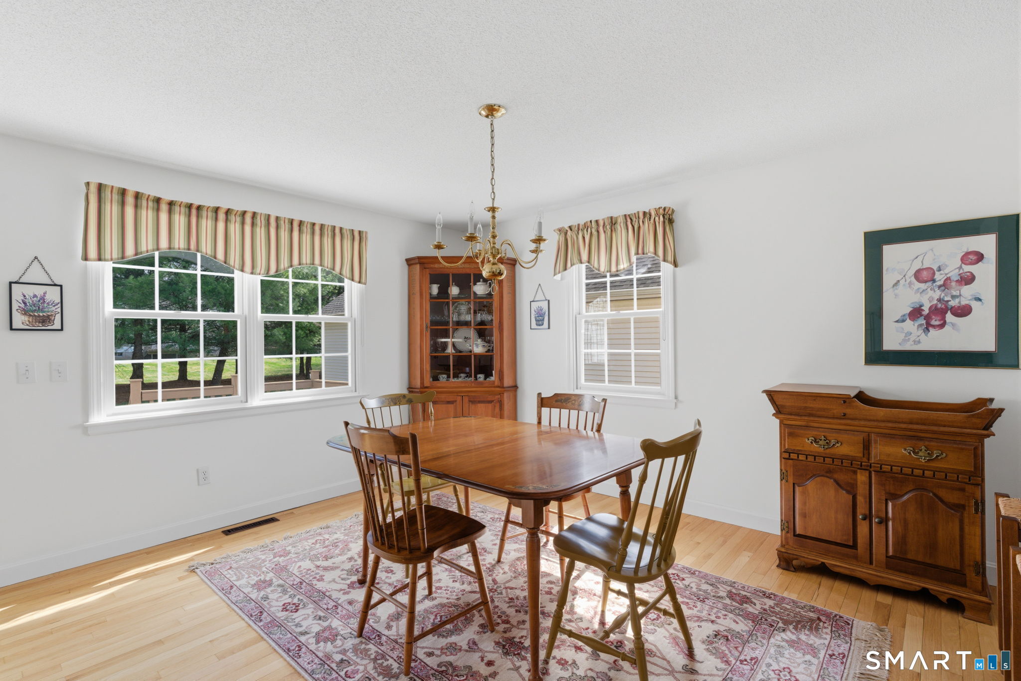 42 Dunham Street, Unit 42 Wethersfield, CT 06109 - Photo 24 of 40 a dining room with furniture and window