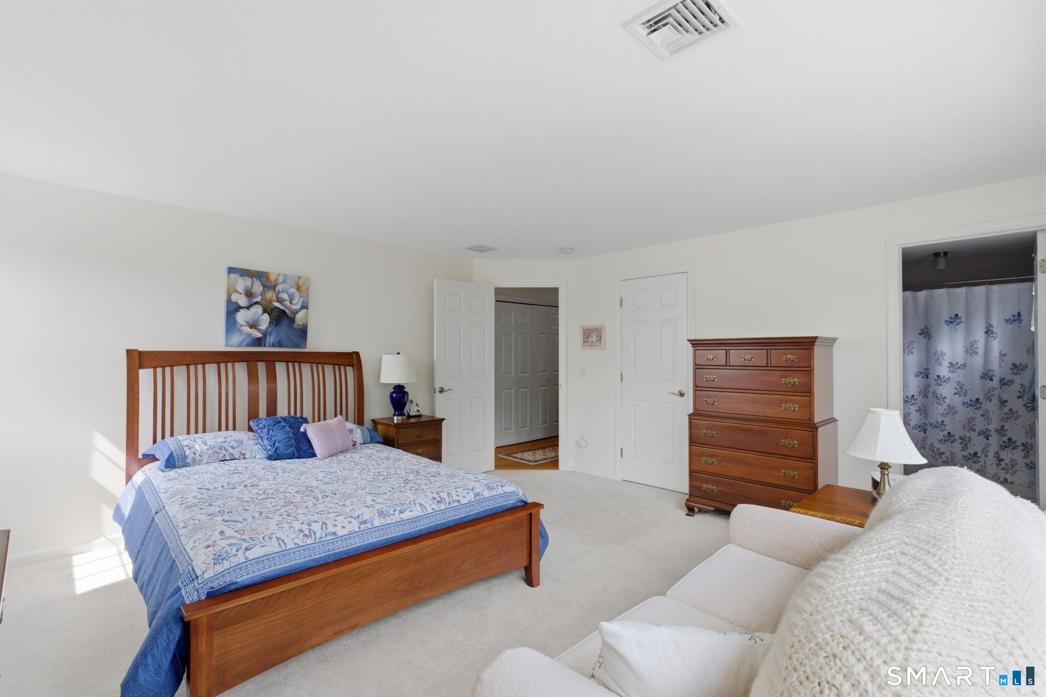 42 Dunham Street, Unit 42 Wethersfield, CT 06109 - Photo 27 of 40 a bedroom with a bed and furniture