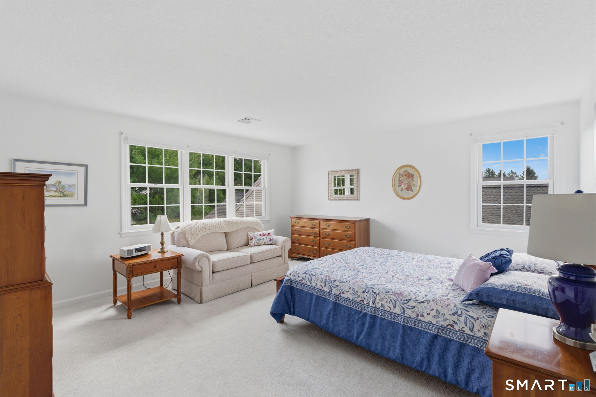 42 Dunham Street, Unit 42 Wethersfield, CT 06109 - Photo 28 of 40 a bedroom with a bed and a window