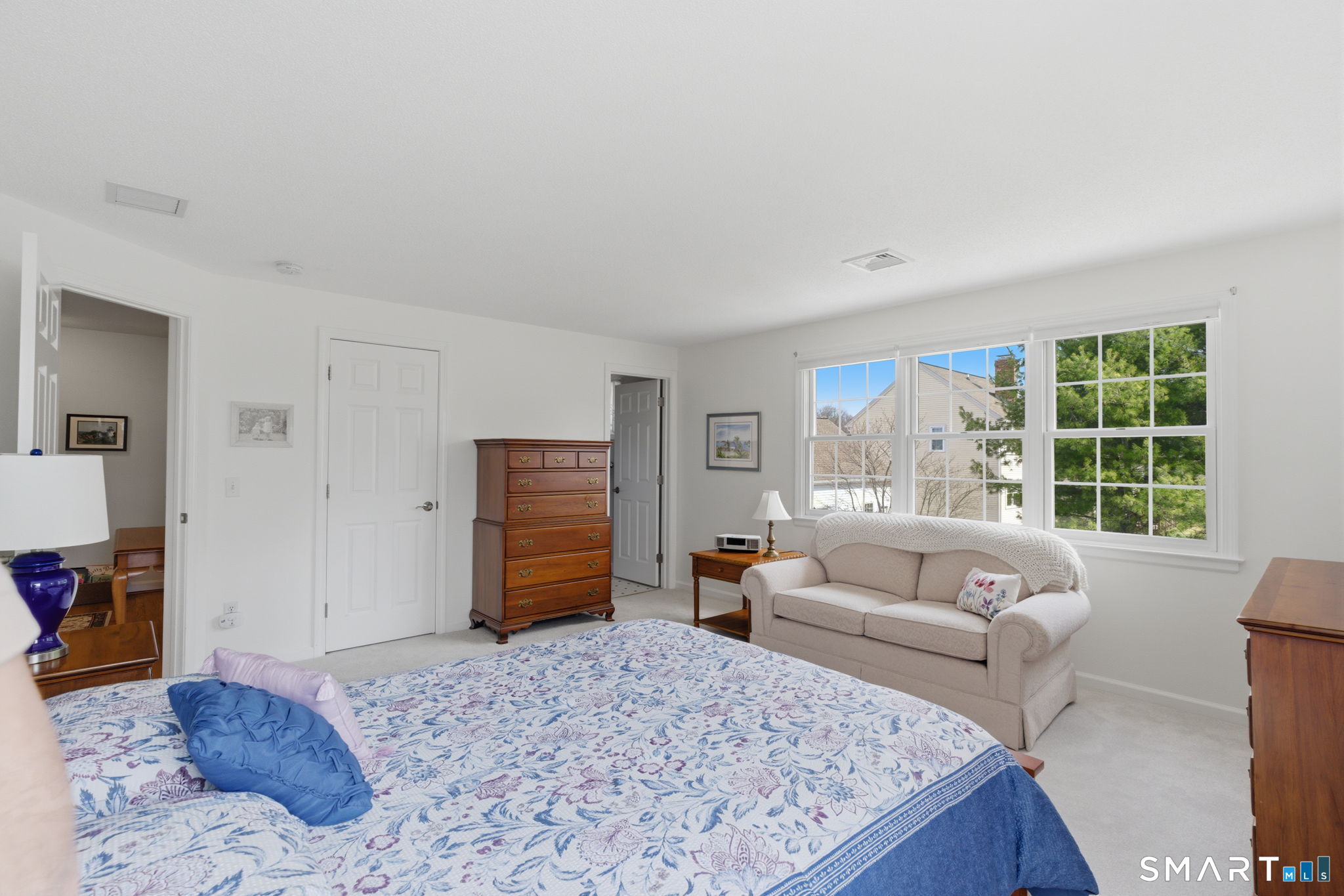 42 Dunham Street, Unit 42 Wethersfield, CT 06109 - Photo 29 of 40 a living room with furniture and a large window