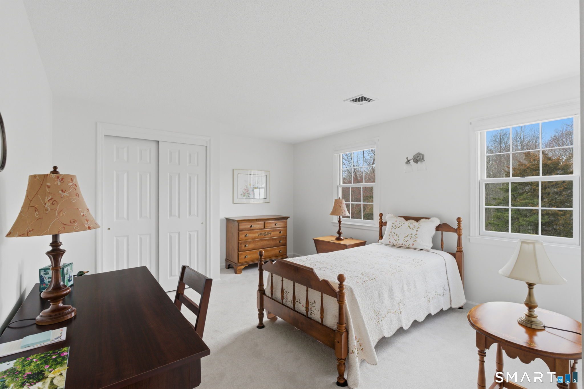 42 Dunham Street, Unit 42 Wethersfield, CT 06109 - Photo 31 of 40 a bedroom with a bed and a window