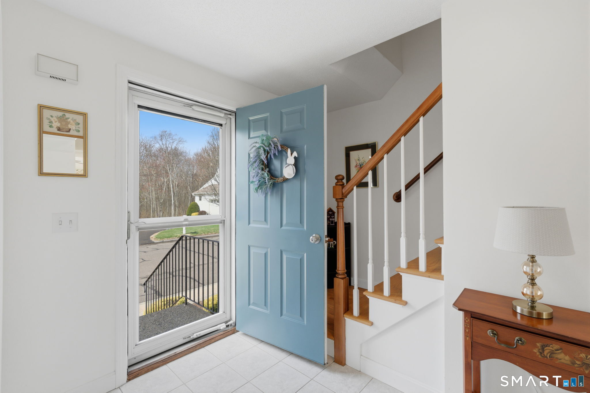 42 Dunham Street, Unit 42 Wethersfield, CT 06109 - Photo 8 of 40 a view of a hallway with a flower pot