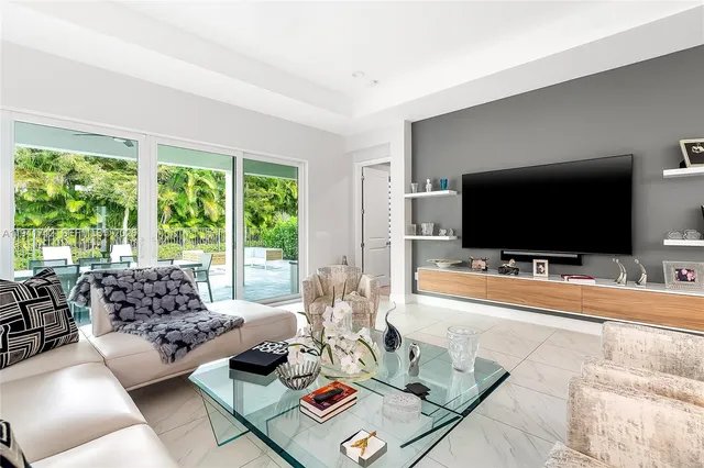a kitchen with a white cabinets and white appliances