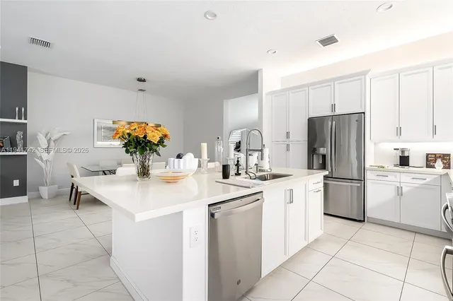 a view of a workspace with furniture