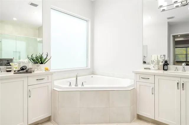 a view of a backyard with sitting area