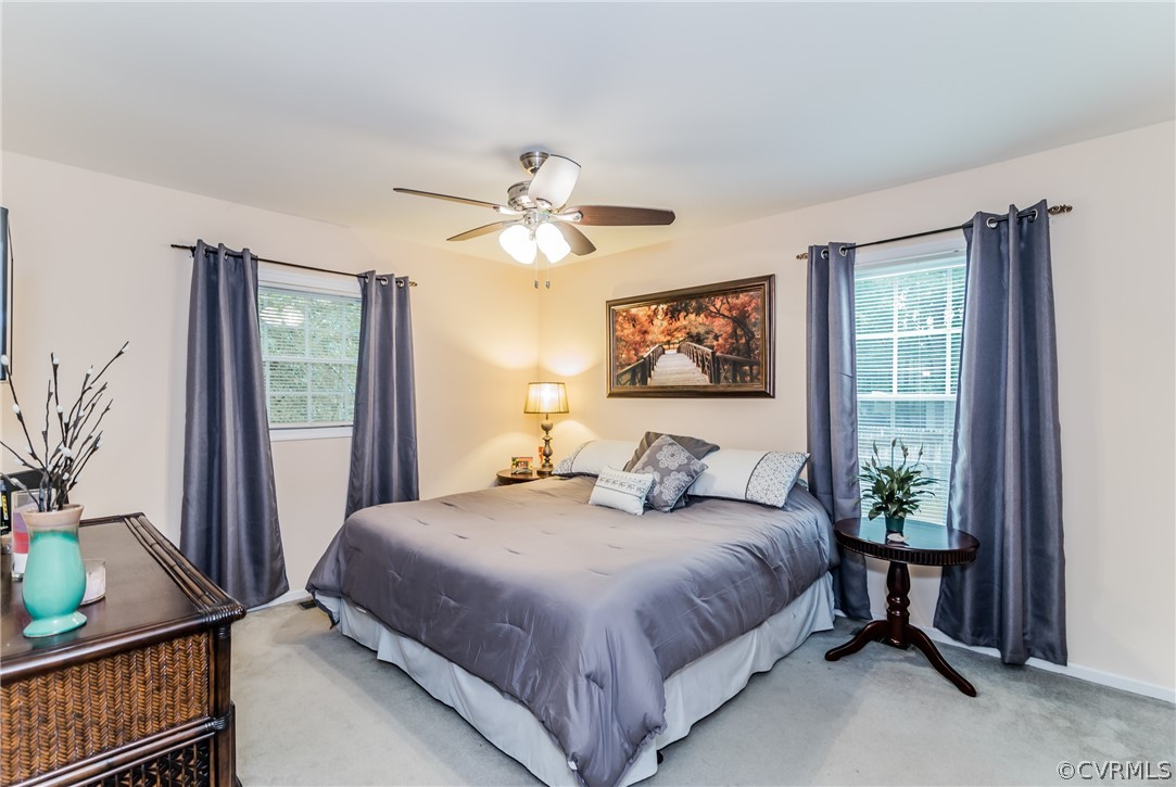 5242 Rollingway Road Chesterfield, VA 23832 - Photo 11 of 24 a bedroom with a large bed and a window