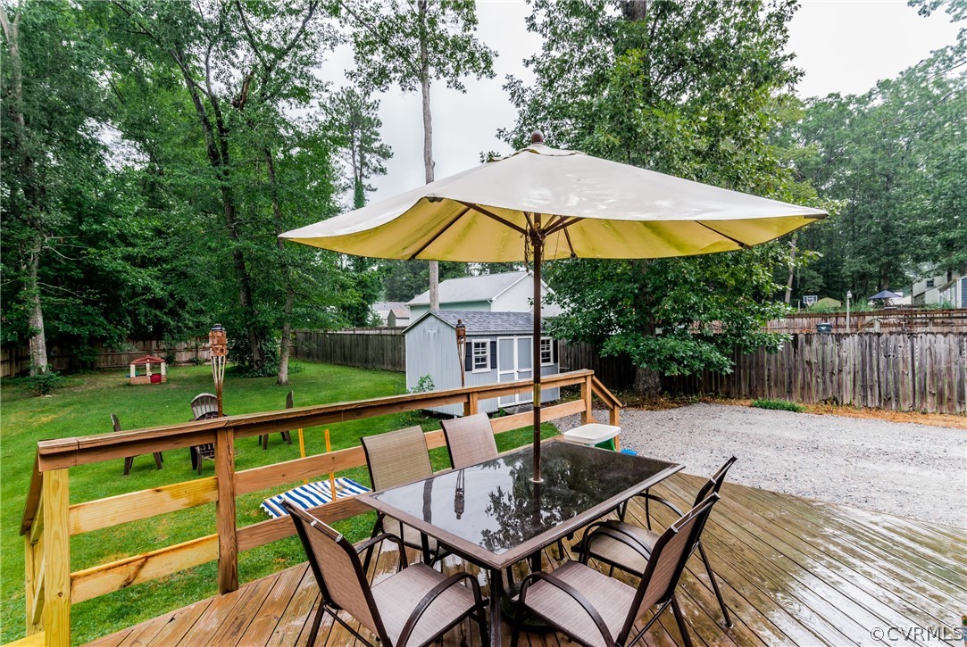 5242 Rollingway Road Chesterfield, VA 23832 - Photo 21 of 24 a view of a chair and table on the wooden floor