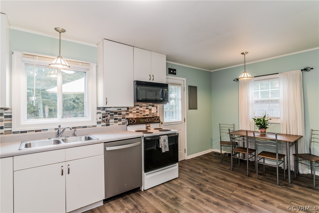 5242 Rollingway Road Chesterfield, VA 23832 - Photo 6 of 24 a kitchen with a sink stove and white cabinets
