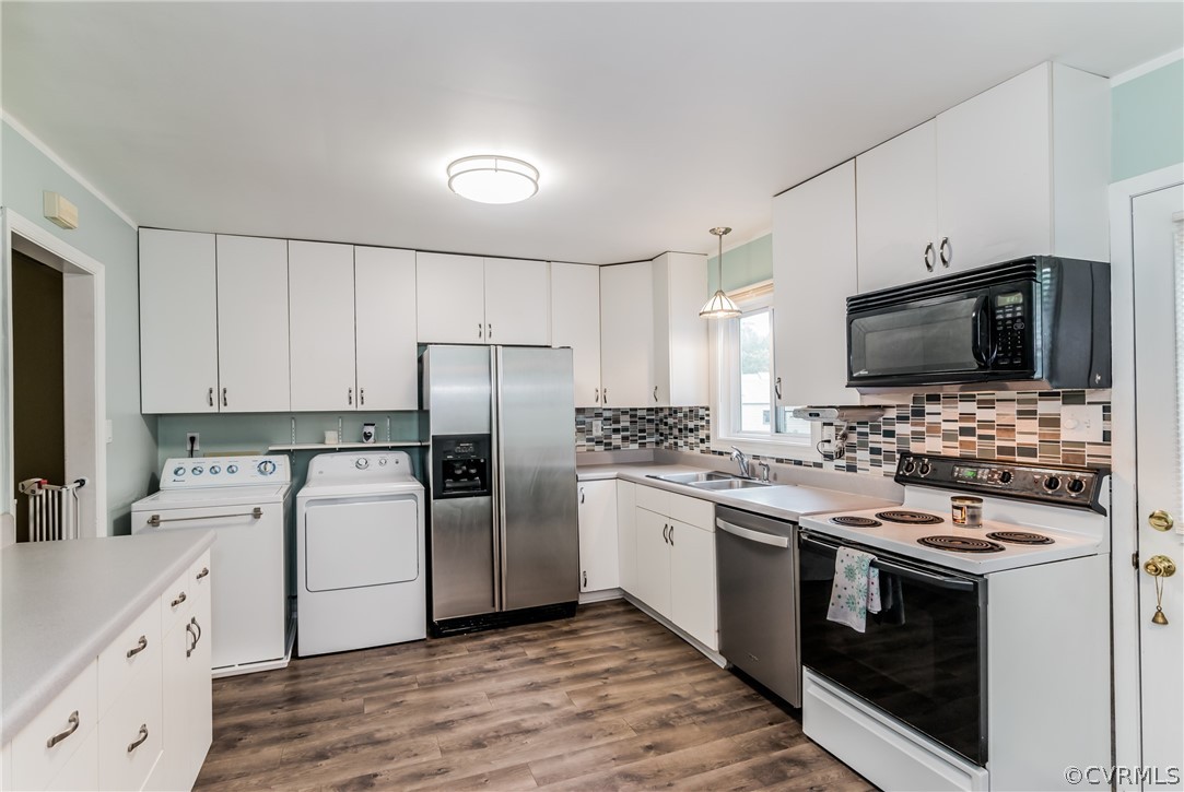 5242 Rollingway Road Chesterfield, VA 23832 - Photo 8 of 24 a kitchen with a sink stove and refrigerator
