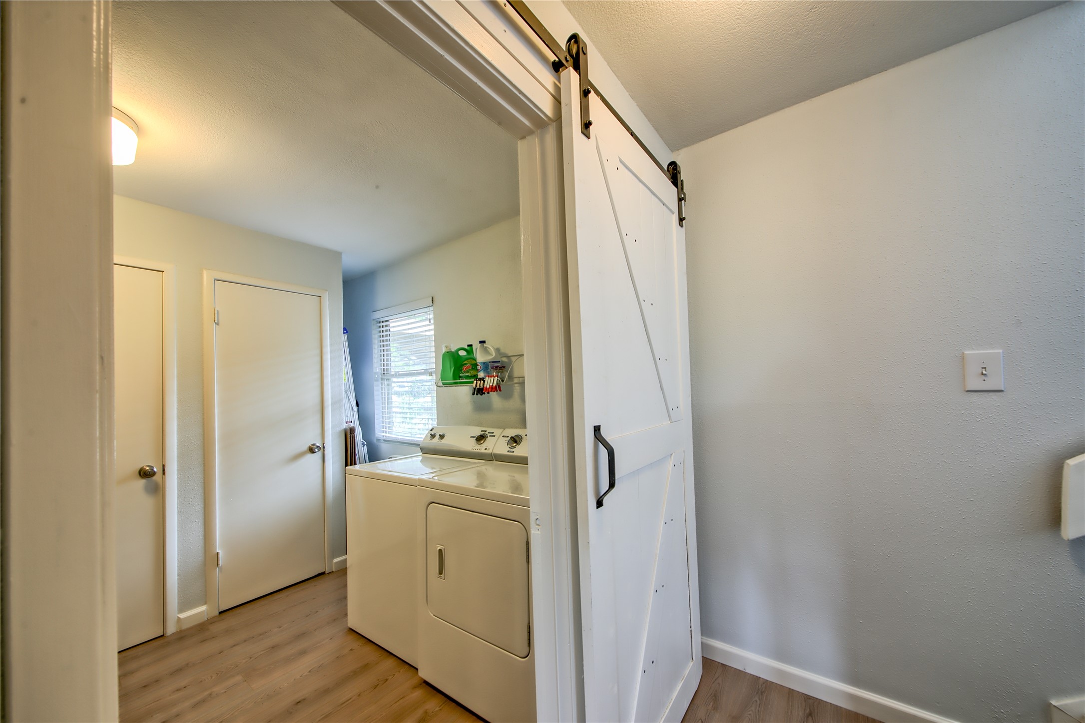 549 Demarett Drive Point Venture, TX 78645 - Photo 20 of 31 a room with a washer and dryer