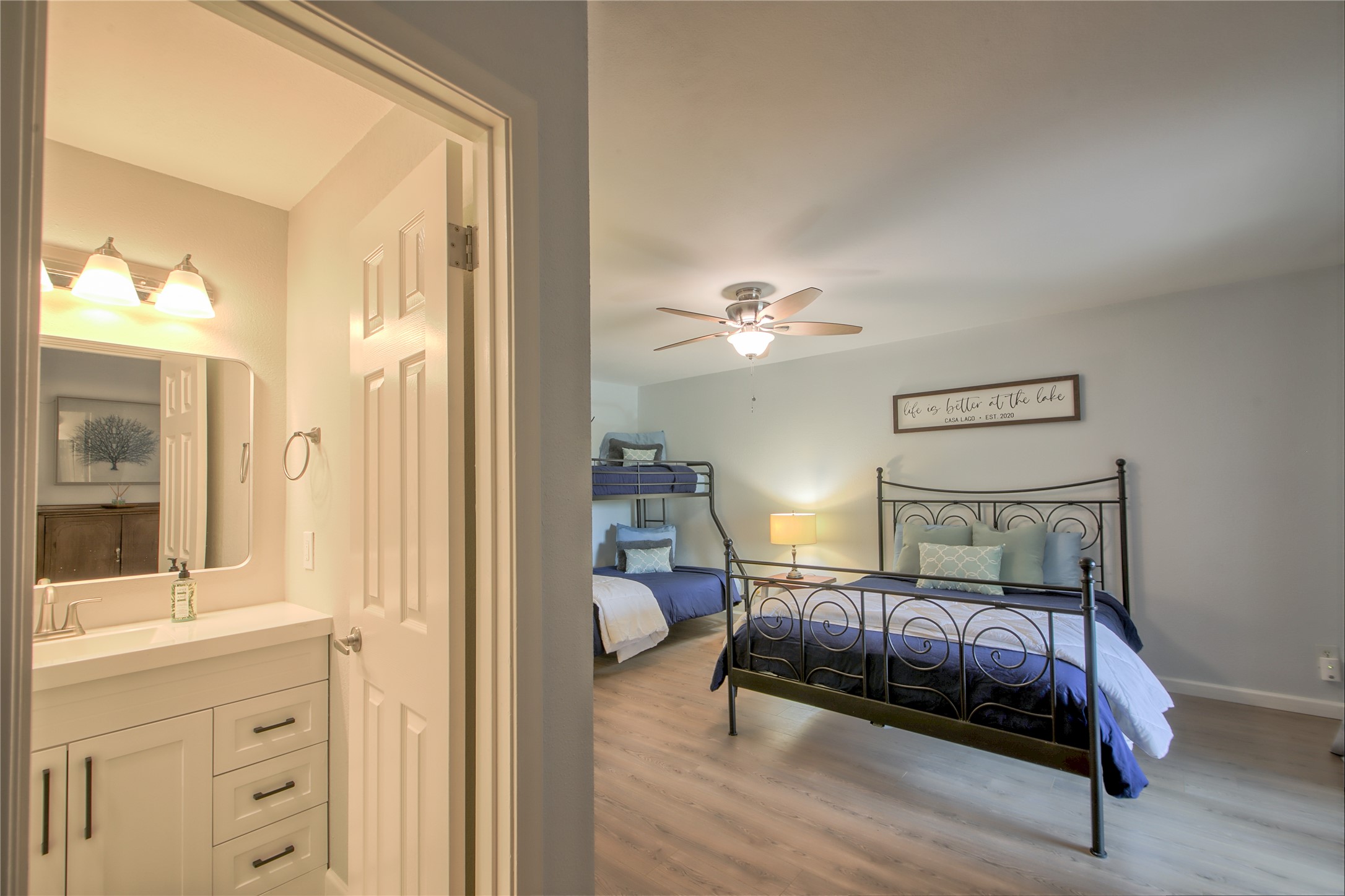 549 Demarett Drive Point Venture, TX 78645 - Photo 24 of 31 a bedroom with furniture and a mirror