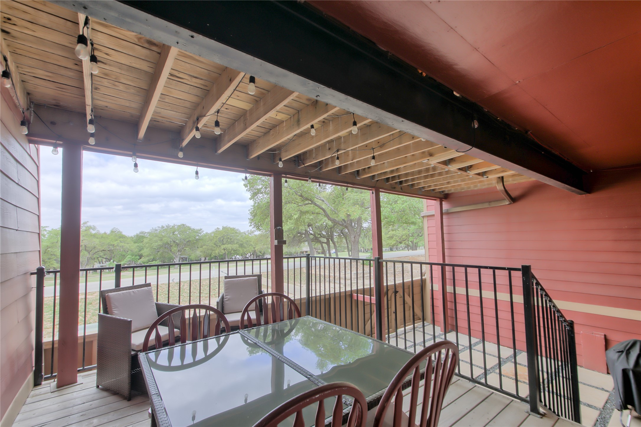 549 Demarett Drive Point Venture, TX 78645 - Photo 26 of 31 a view of a chair and table in the balcony