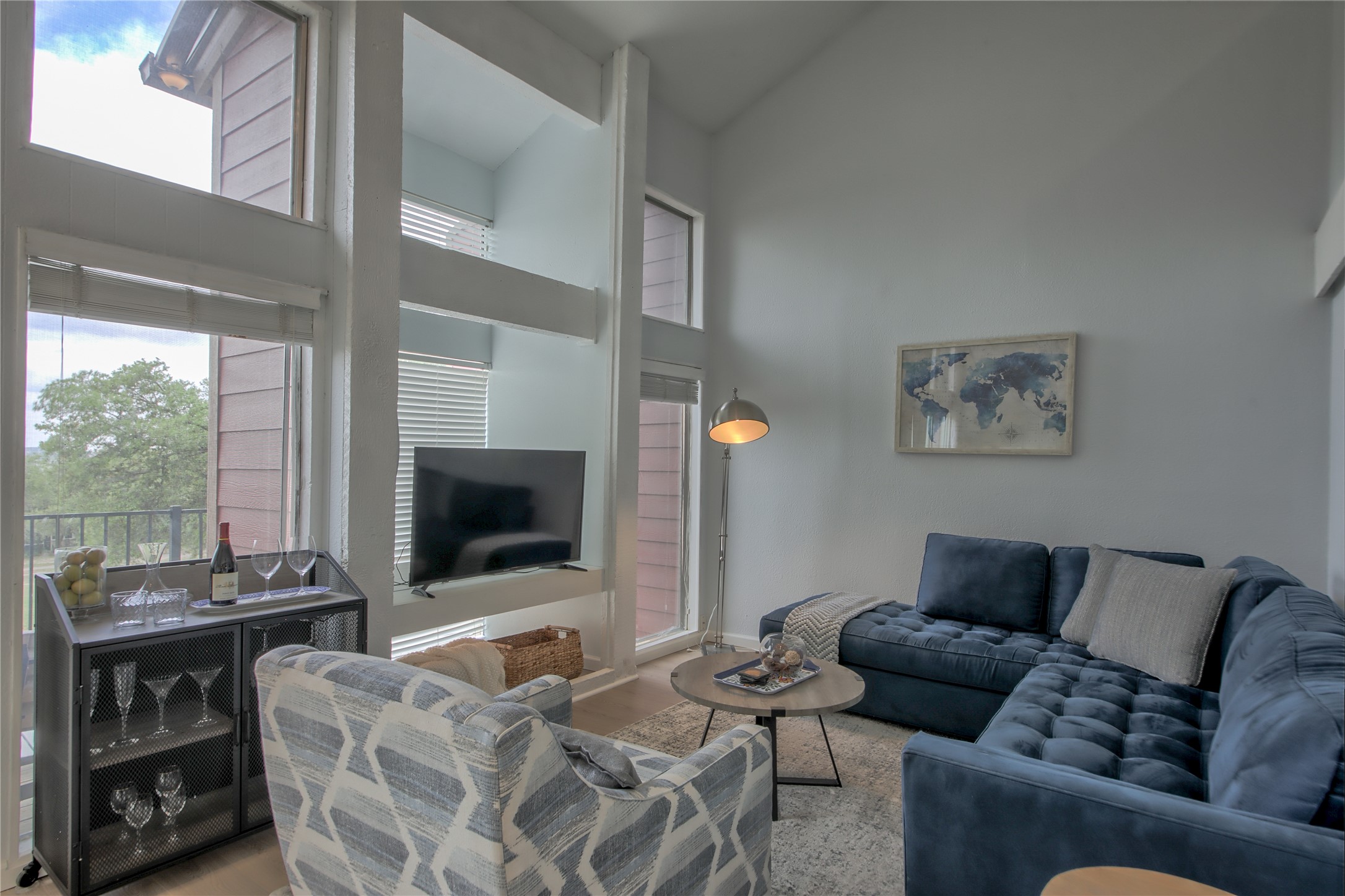 549 Demarett Drive Point Venture, TX 78645 - Photo 10 of 31 a living room with furniture and a flat screen tv