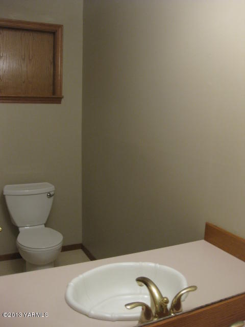 9530 Mieras Road Yakima, WA 98901 - Photo 26 of 55 a bathroom with a toilet and a sink