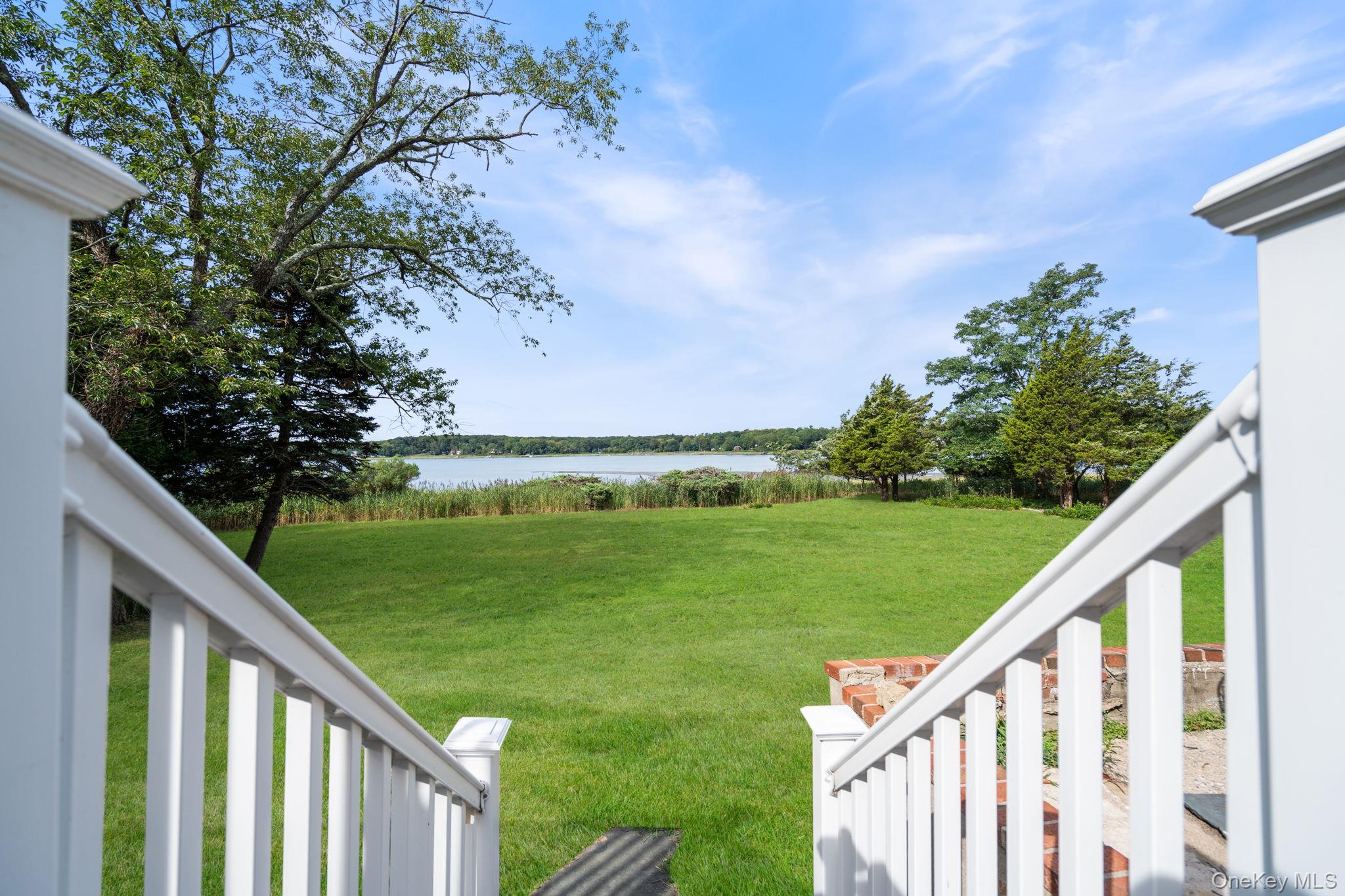 24 Conscience Circle Setauket, NY 11733 - Photo 22 of 31 a balcony with an outdoor space