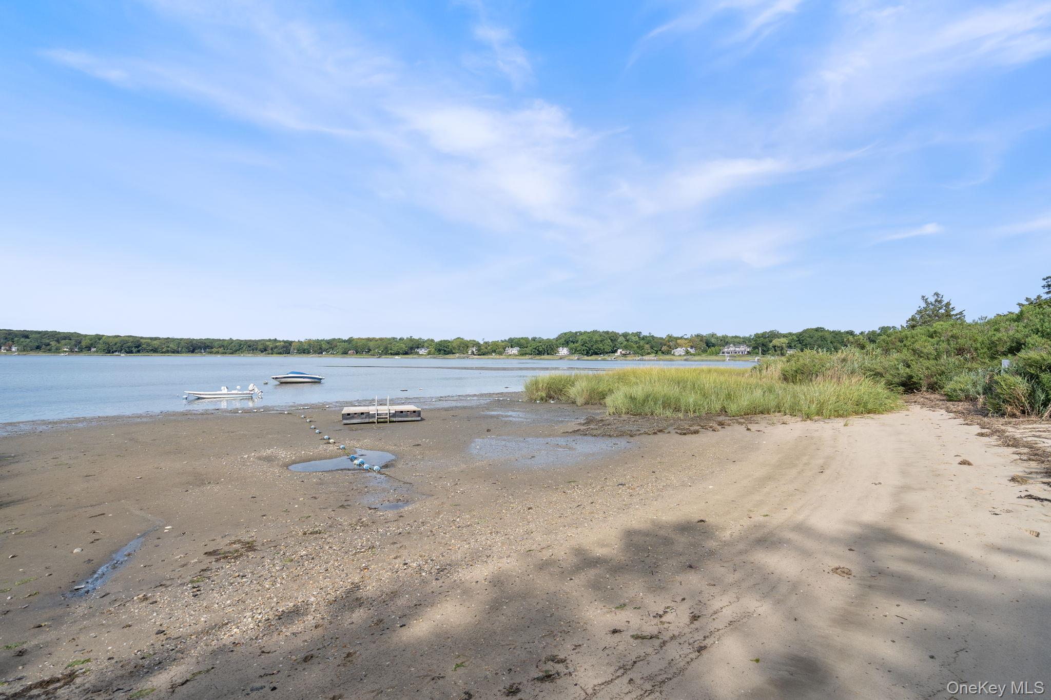 24 Conscience Circle Setauket, NY 11733 - Photo 30 of 31 a view of an ocean and beach