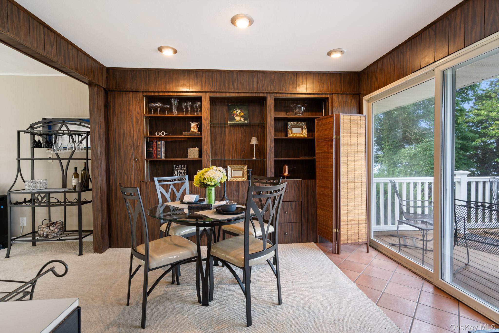 24 Conscience Circle Setauket, NY 11733 - Photo 10 of 31 a view of a livingroom with furniture and staircase