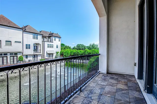 a view of a street from a balcony
