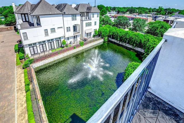 a view of swimming pool with a garden