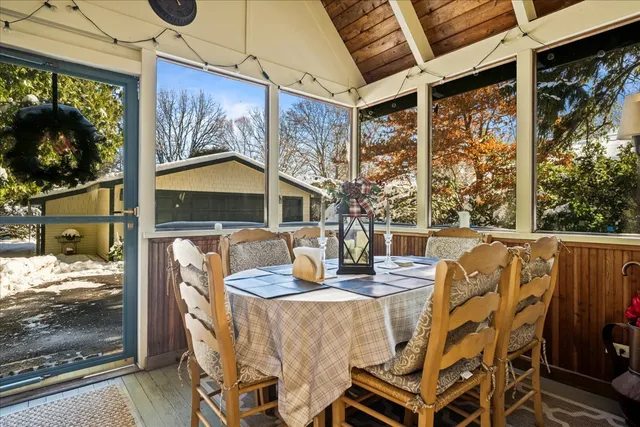 a view of an outdoor dining space with furniture
