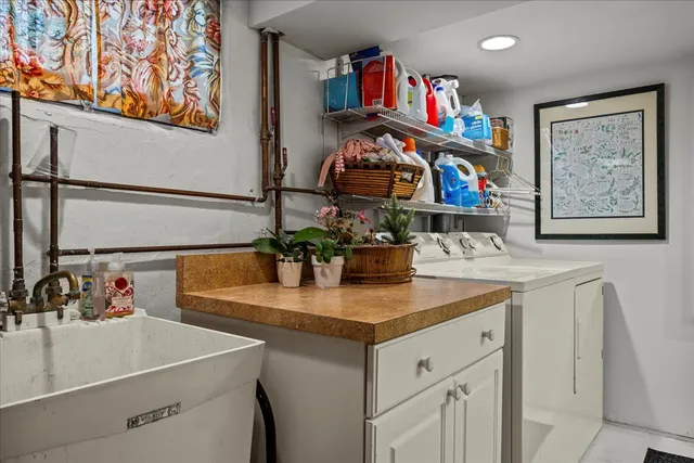 a bathroom with sink and a mirror