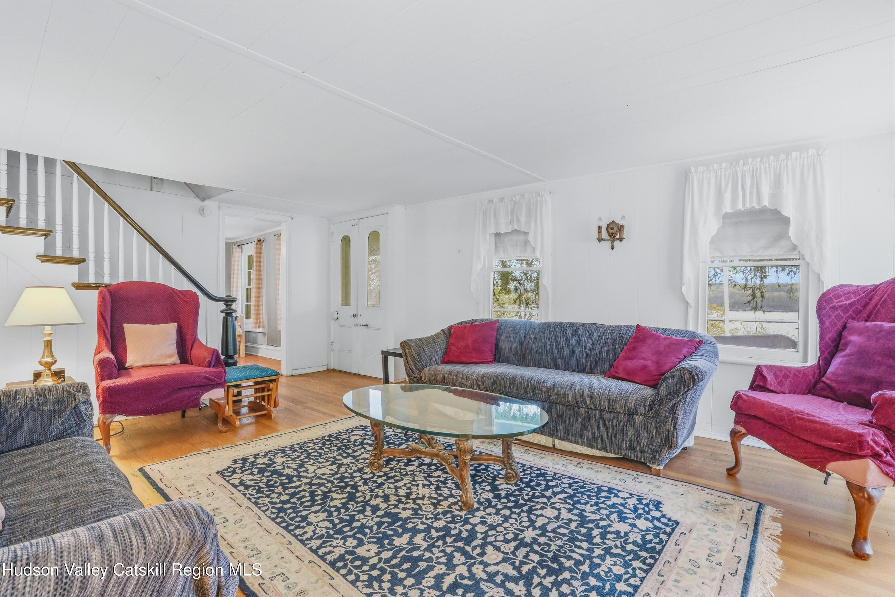 167 Patterson Road West Camp, NY 12490 - Photo 11 of 43 a living room with furniture and a rug